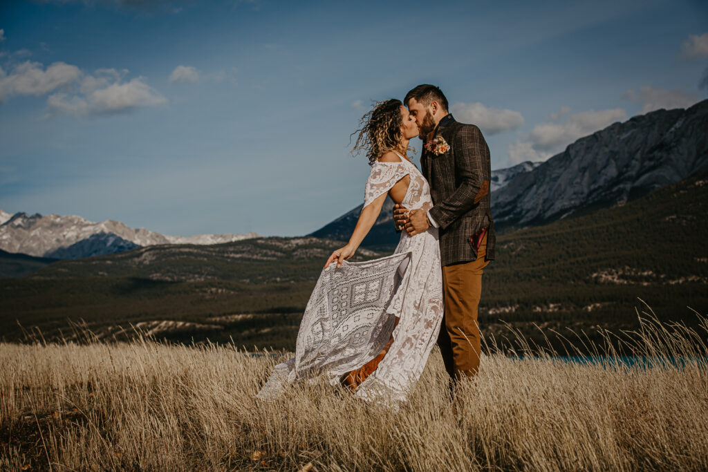 romantic bohemian bride and groom during a vow renewal in Alberta, Canada