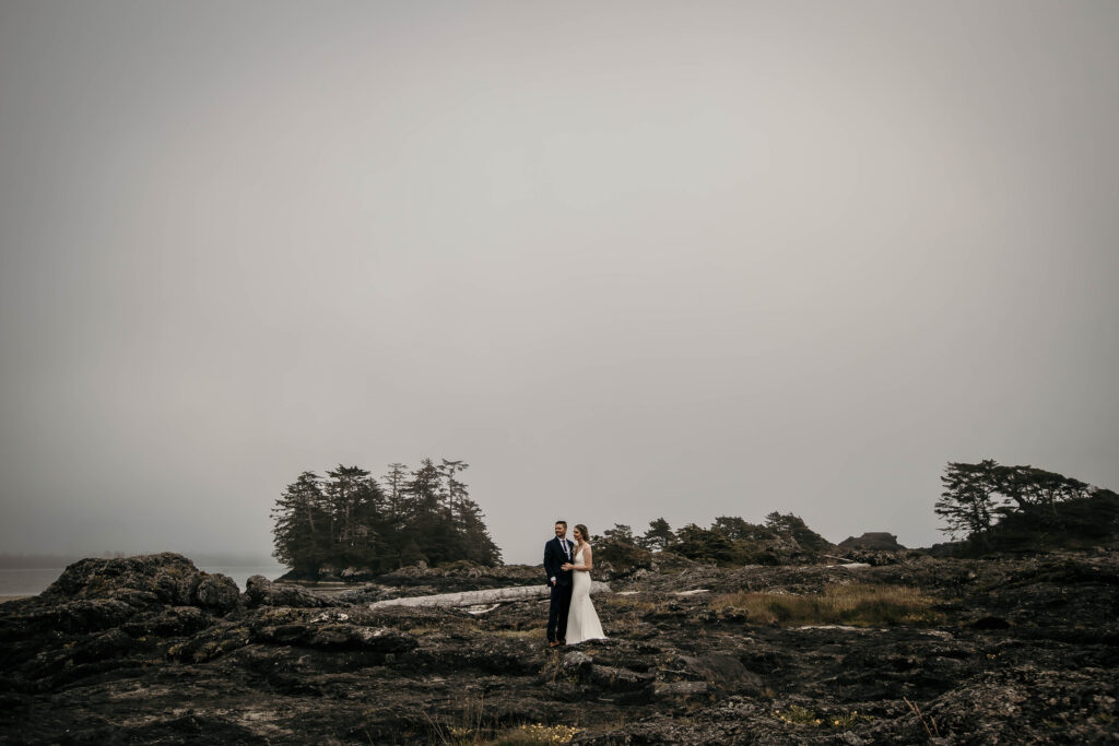Couple sharing an intimate adventure elopement moment on the west coast of Vancouver Island in Tofino and Ucluelet.