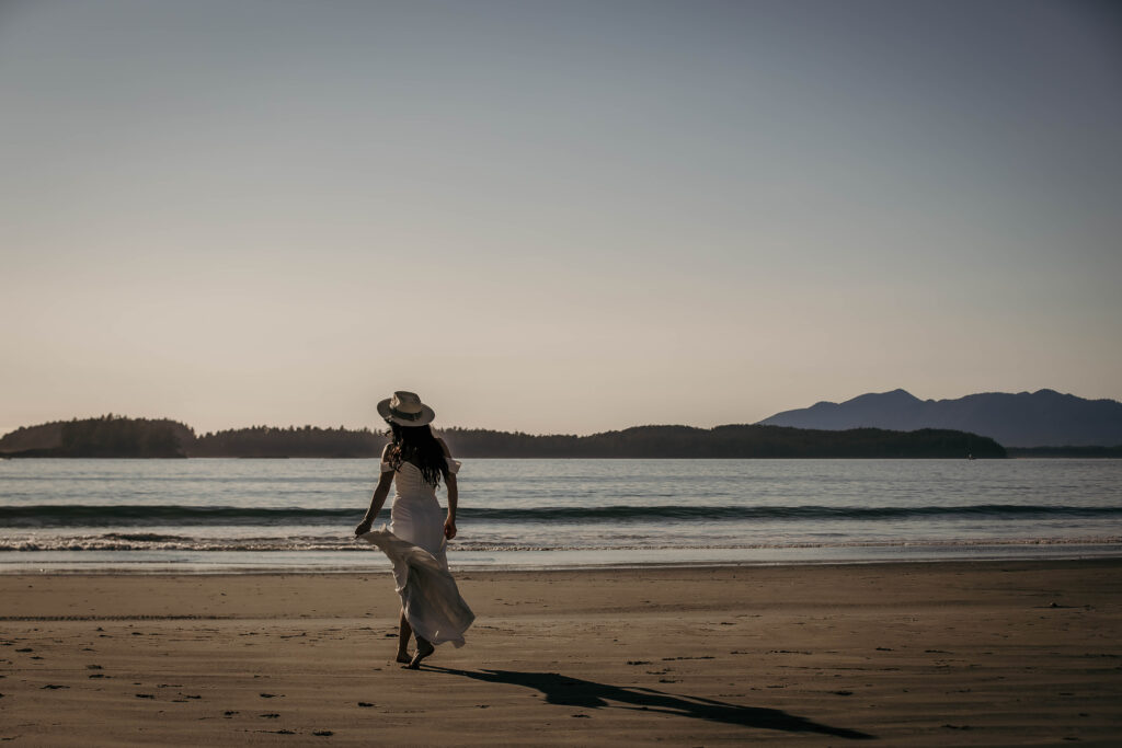 Bride in a flowing dress posing during a Tofino or Ucluelet adventure elopement.